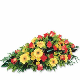 palma mortuoria flores temporada en amarillo y rojo