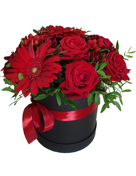 caja flores con rosas rojas y gerberas rojas